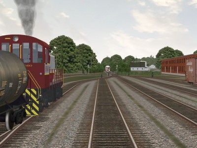 While westbound extra waits on yard scale Halifax bound Dayliner enters Kentville yard.