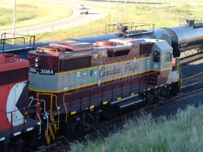 EMD GP38-2, CP No. 3084 sporting the old CPR colours at East Edmonton just north of the Suncor refinery on August 8, 2013.