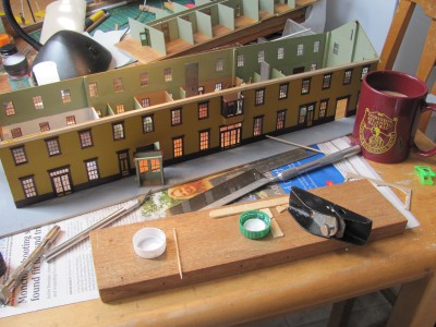 Working on the bays with some help from the Middleton museum DAR mug..