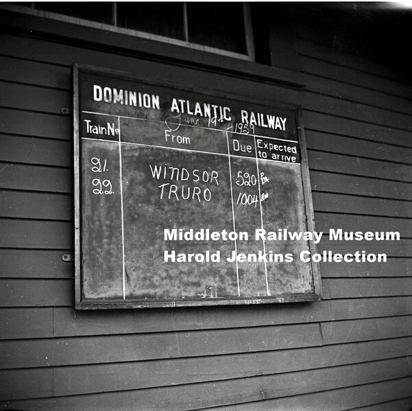 File:DAR - Station Time Table Board - Trains 21 22 - Truro Sub - Harold Jenkins Photo - Unknown Station - 19June1958.JPG