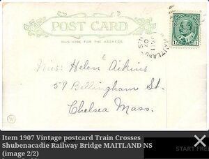Train Crosses Shubenacadie Railway Bridge MAITLAND NS reverse.jpg